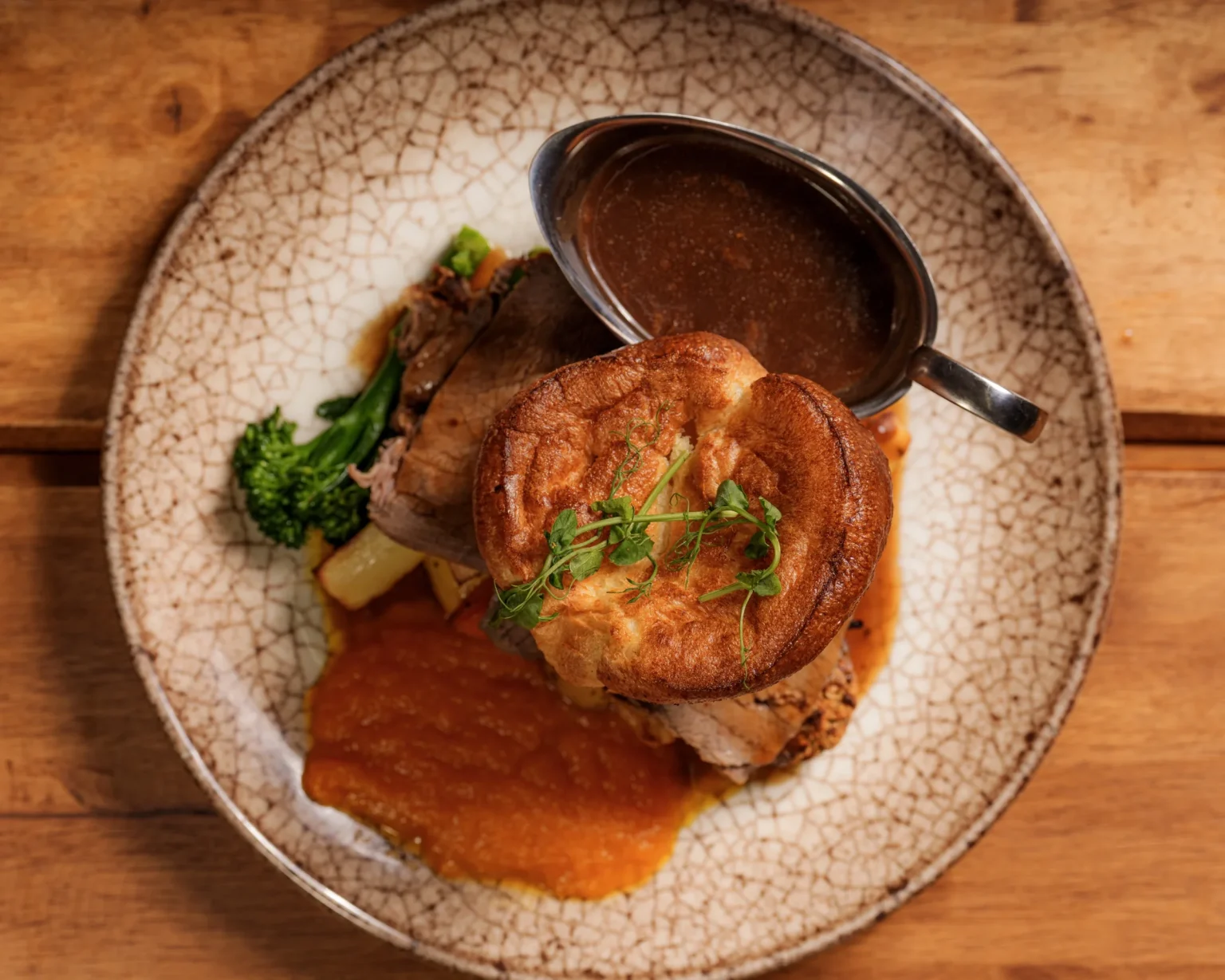 Sunday roast with Yorkshire pudding, roast potatoes, vegetables and gravy at Dolce & Blush Blackpool