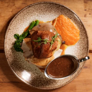 Sunday roast with Yorkshire pudding, roast potatoes, vegetables and gravy at Dolce & Blush Blackpool
