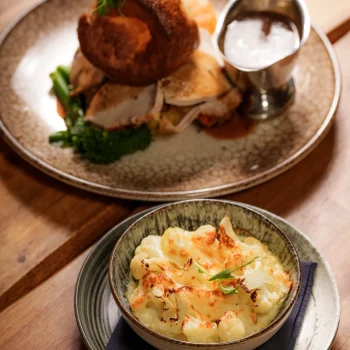 Sunday roast with Yorkshire pudding, roast potatoes, vegetables and gravy at Dolce & Blush Blackpool
