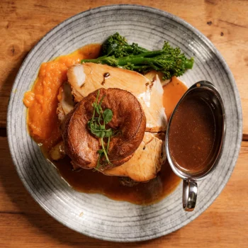 Sunday roast with Yorkshire pudding, roast potatoes, vegetables and gravy at Dolce & Blush Blackpool